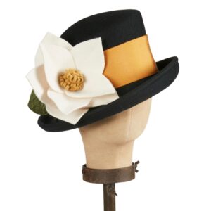 Black hat with flower and orange band.