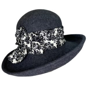 Dark hat with floral ribbon embellishment.