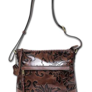 Brown leather handbag with floral pattern.