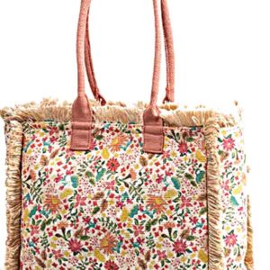 Floral tote bag with pink handles.