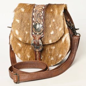 Leather and fur crossbody bag with strap.
