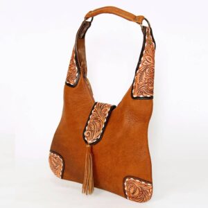 Brown leather handbag with decorative patterns.