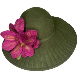Green hat with large purple flower decoration.